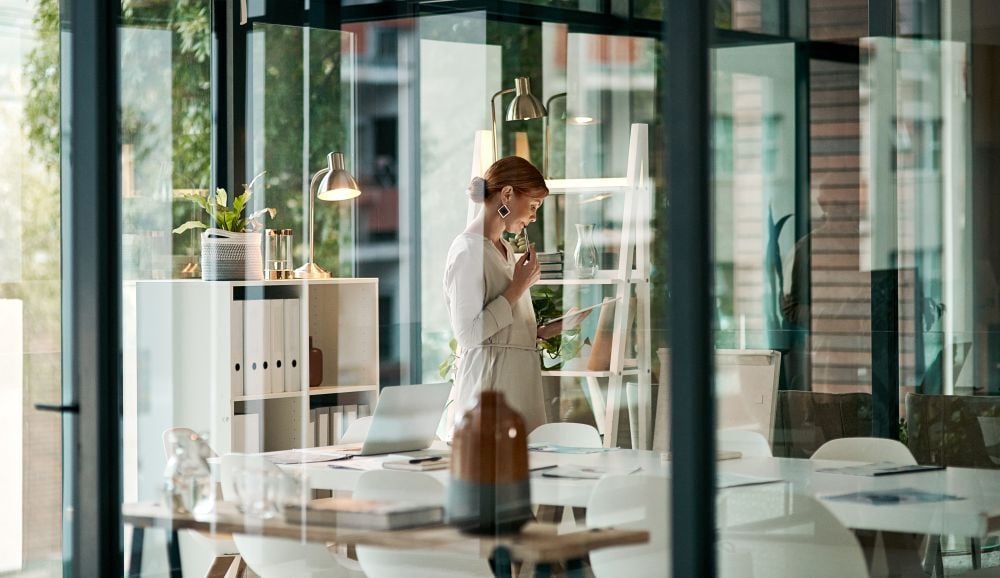 Architecture_Woman professional reviewing designs