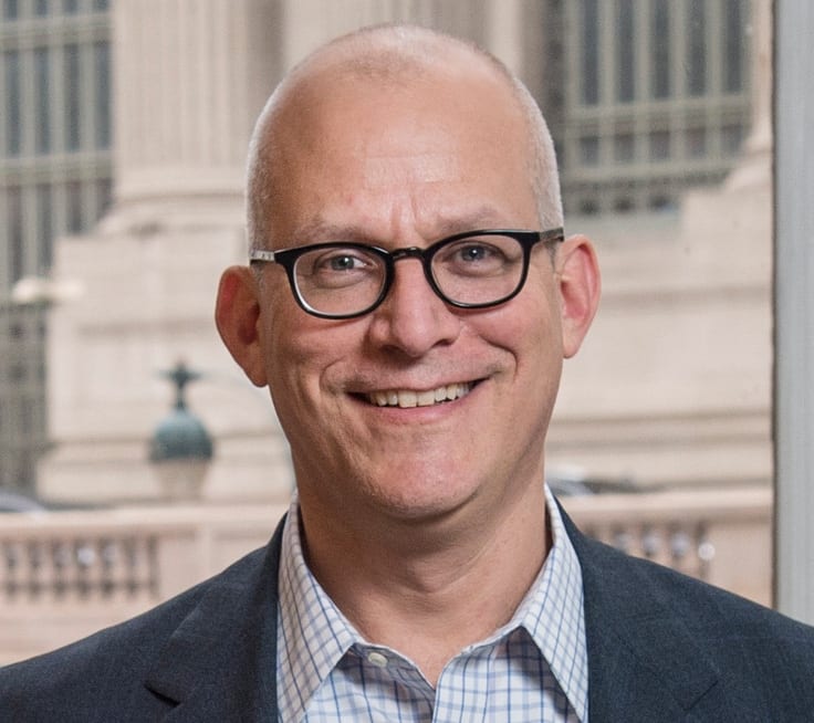 Headshot of John Greenstein, VP of Global Development